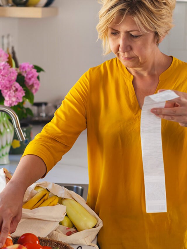 1140-woman-checking-grocery-receipt